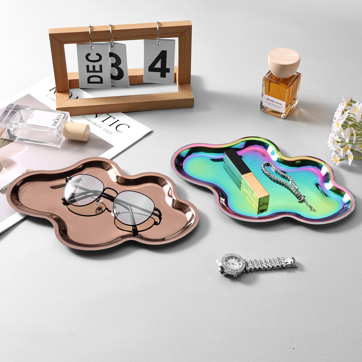 Rose gold and rainbow metal trays in a lifestyle setting