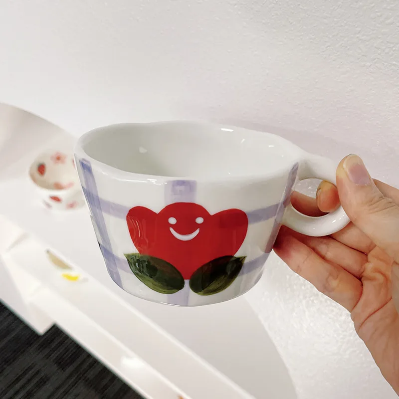 Smiling red flower ceramic mug