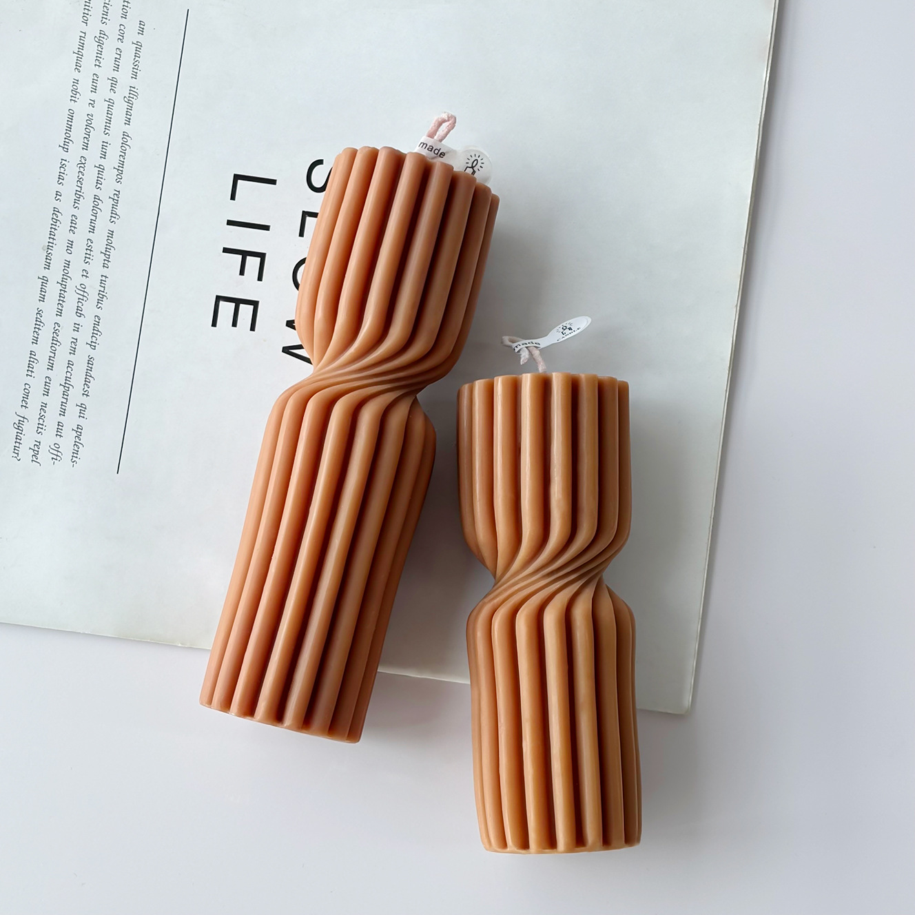 Short and tall ribbed hourglass pillar candle sizes
