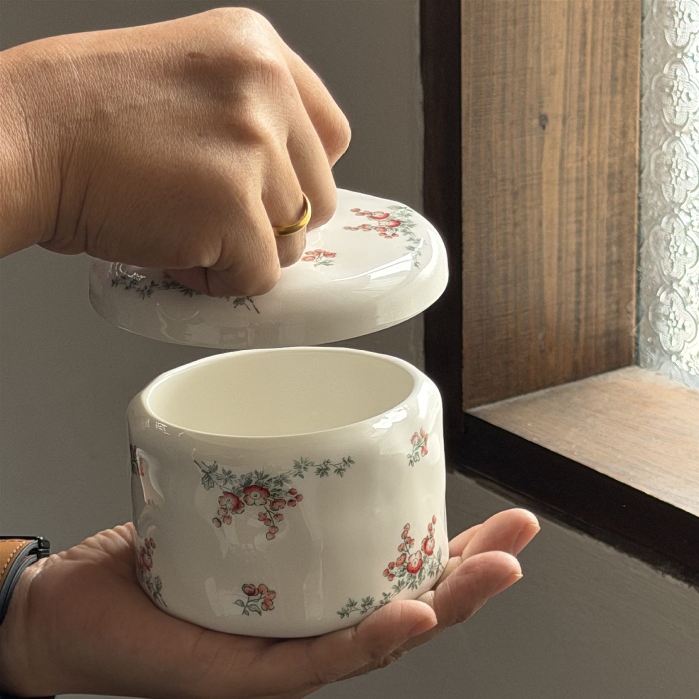 Open vintage floral ceramic storage bowl showing its interior