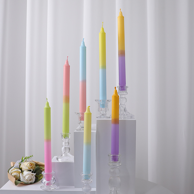 Gradient taper candle collection displayed at varied heights