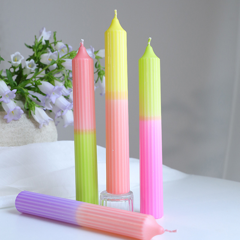 Pink, green and purple gradient ribbed taper candles