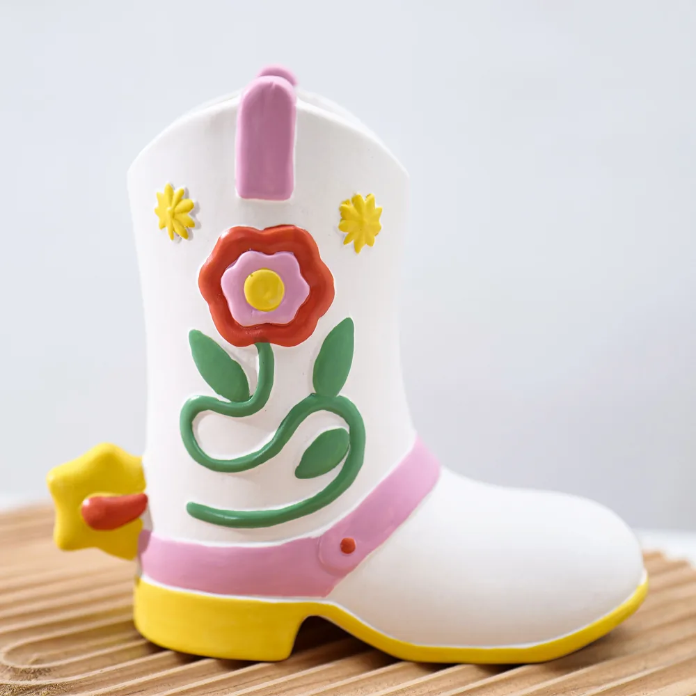 Front view of hand-painted floral boot vase