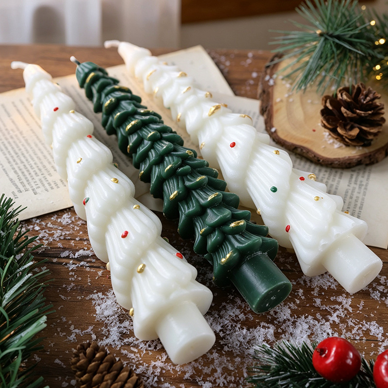 White and green Christmas tree candles displayed horizontally