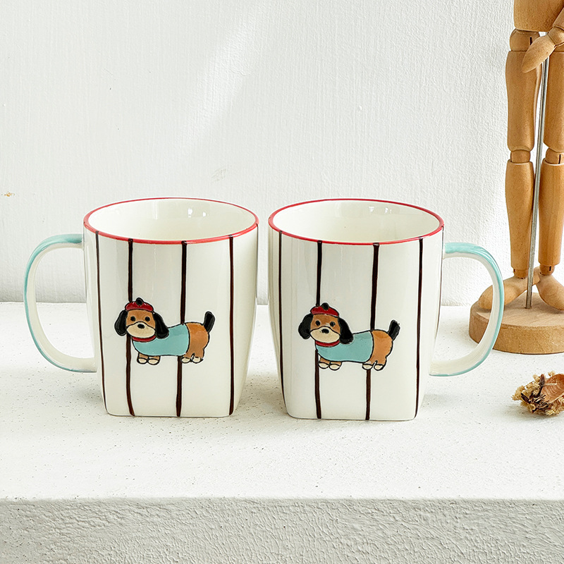 Pair of blue dachshund ceramic mugs