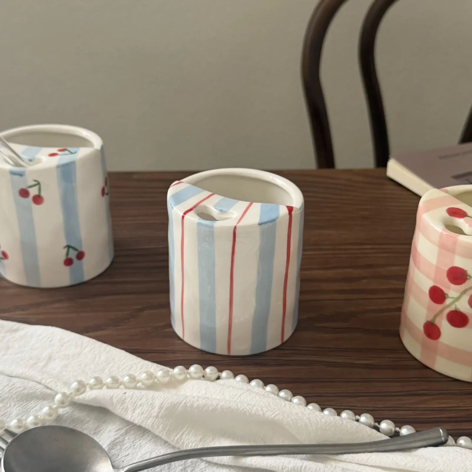 Blue and red striped ceramic mug close-up