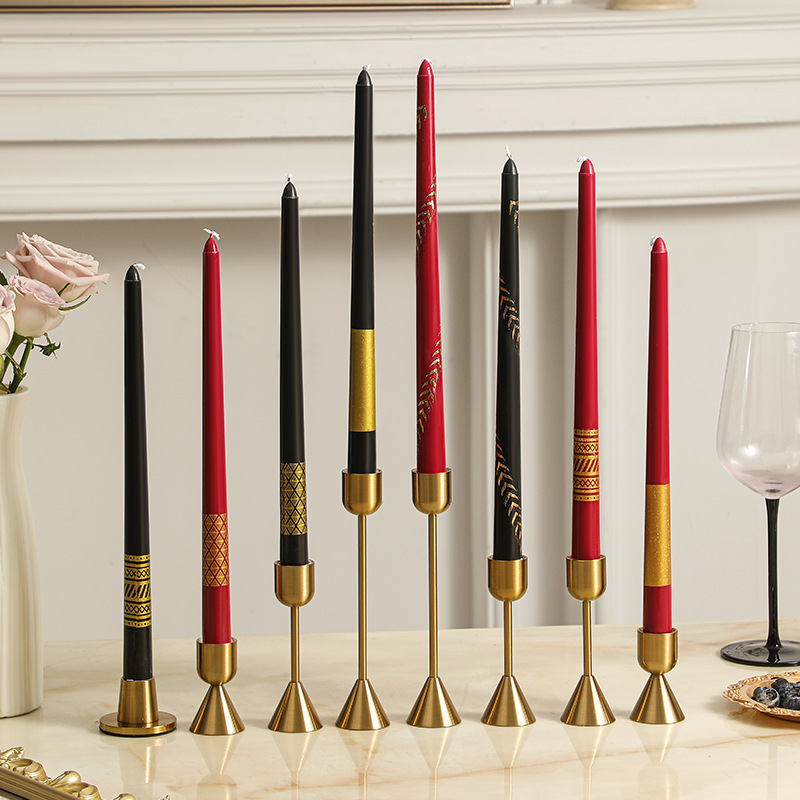 Black and red wedding taper candles with gold details