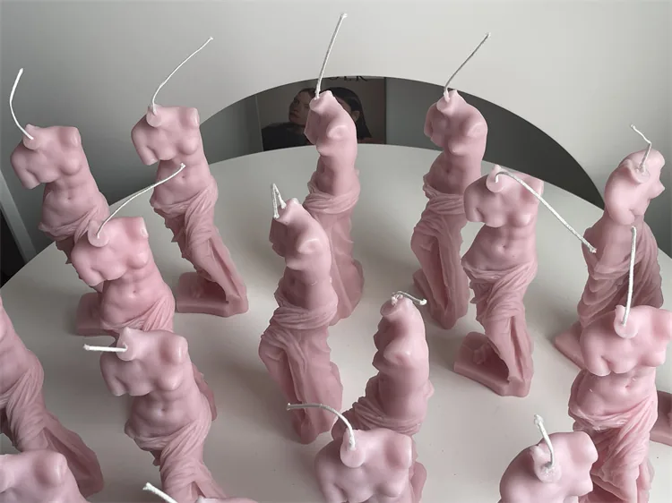 Pink Venus sculpture candle collection