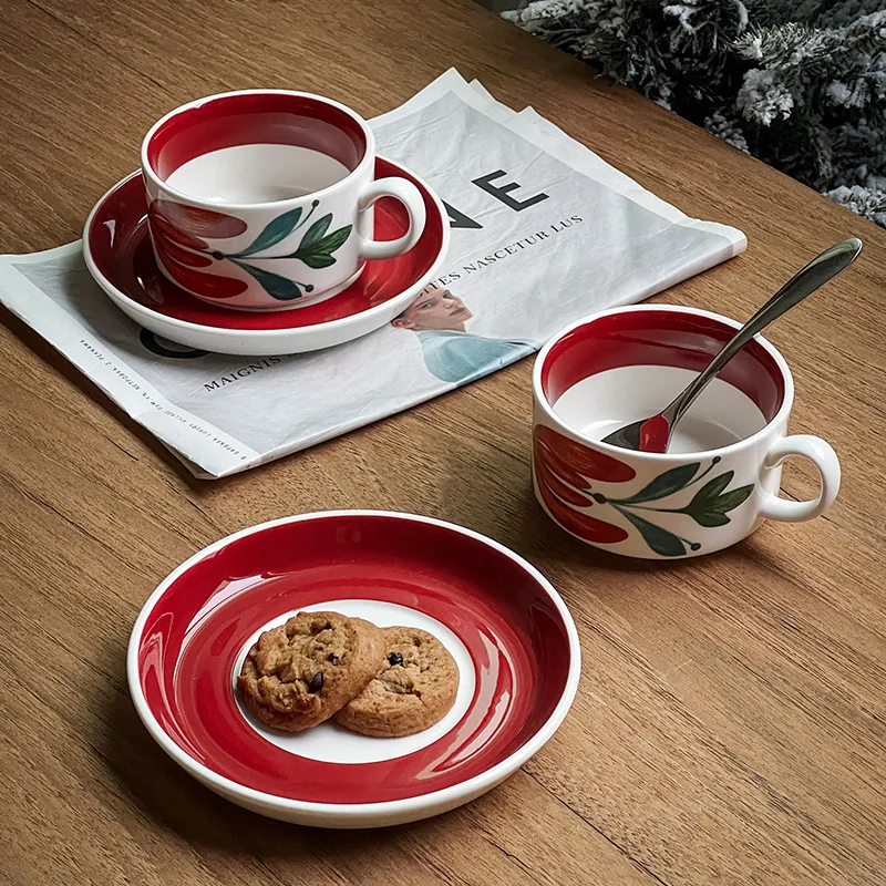 Red floral ceramic coffee cup and saucer collection