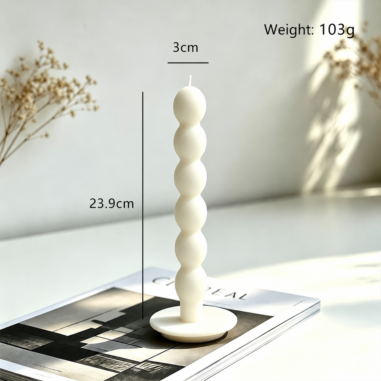 Six-sphere sculptural candle measuring 3 by 23.9 centimeters and weighing 103 grams
