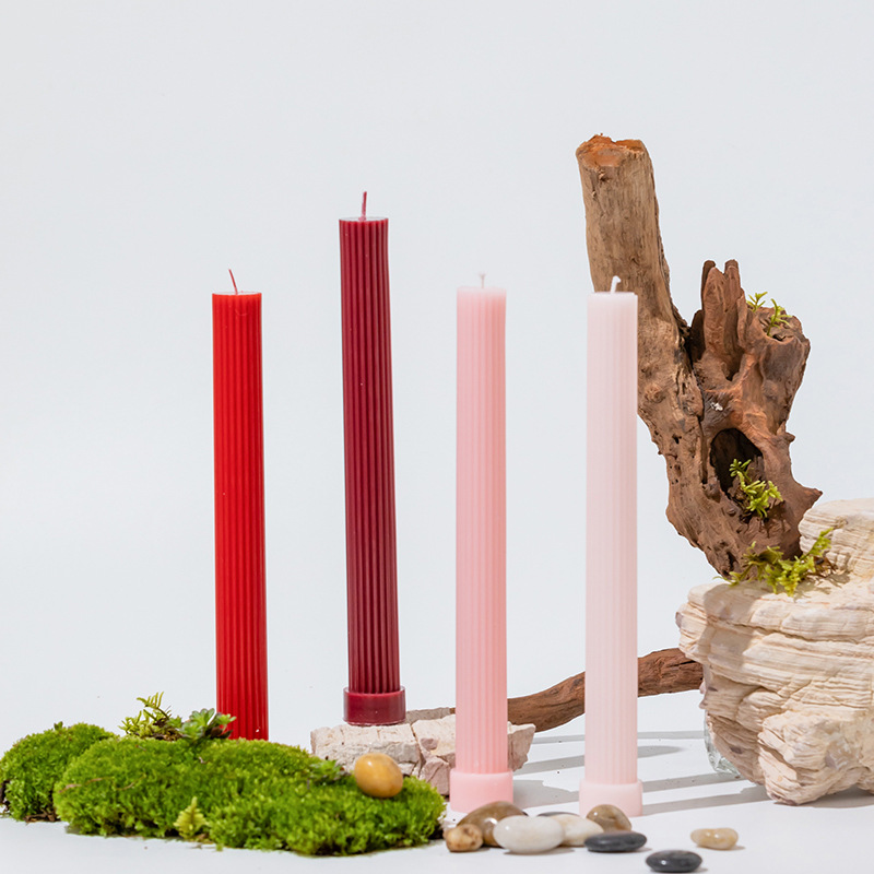Red, burgundy and pink long ribbed candles