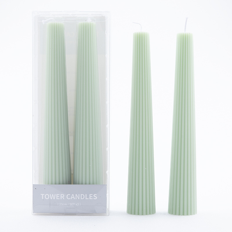 Mint green two-piece tower candle set in clear packaging