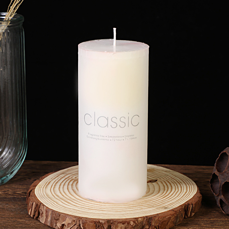 Extra tall wide white pillar candle