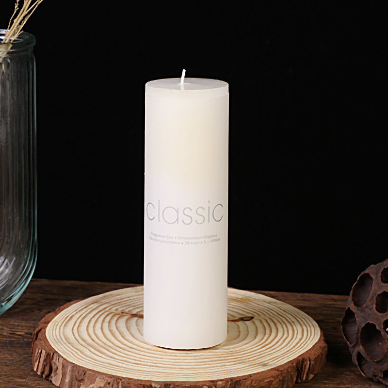 Extra tall slim white pillar candle