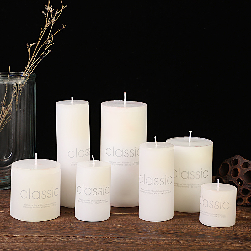 Complete collection of seven white pillar candle sizes