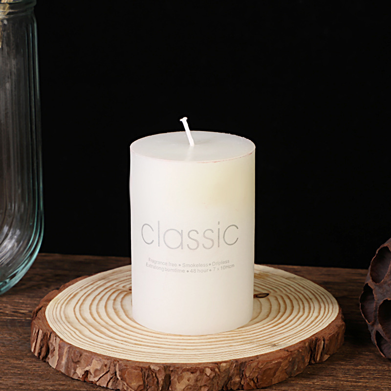 Wide tall white pillar candle for ceremony decor