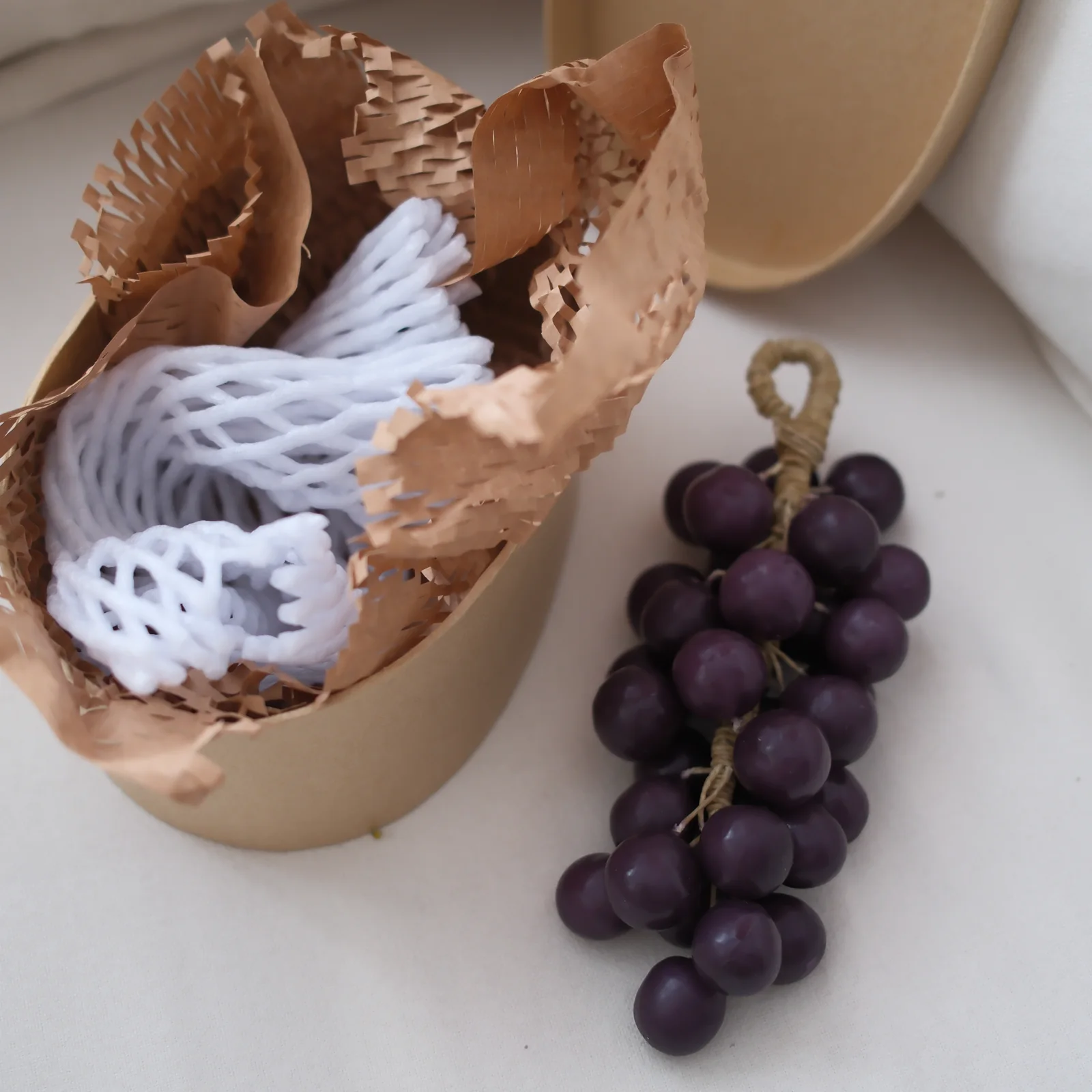Purple grape candle with protective gift packaging