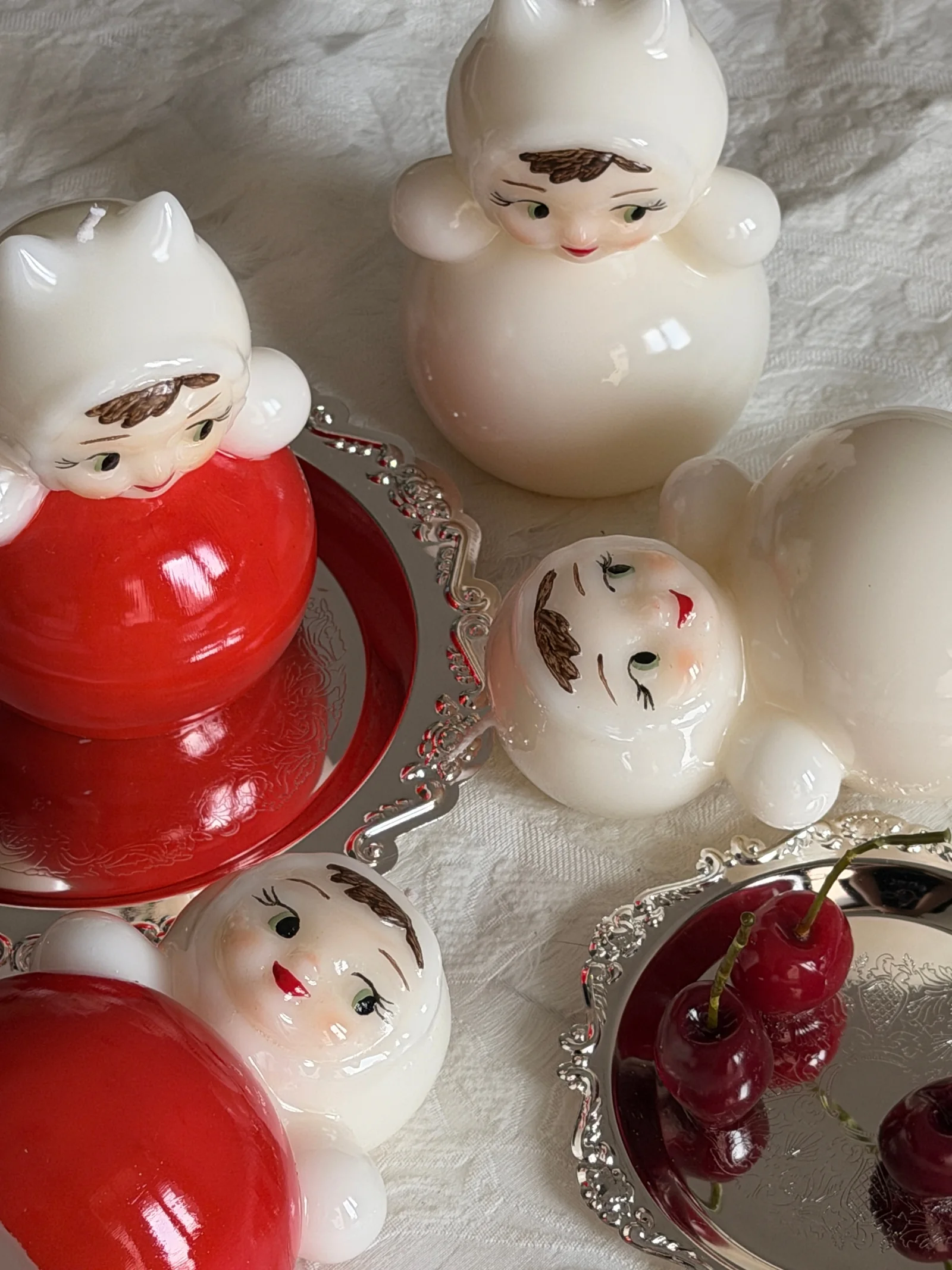 Doll candles with vintage cherries and silver tray