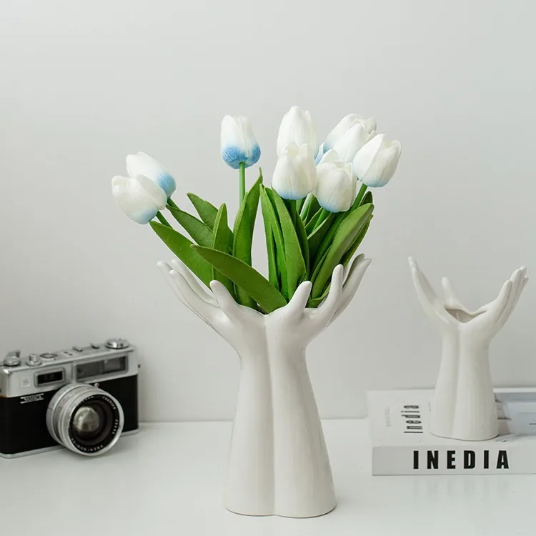 Large and small hand vases in a modern interior