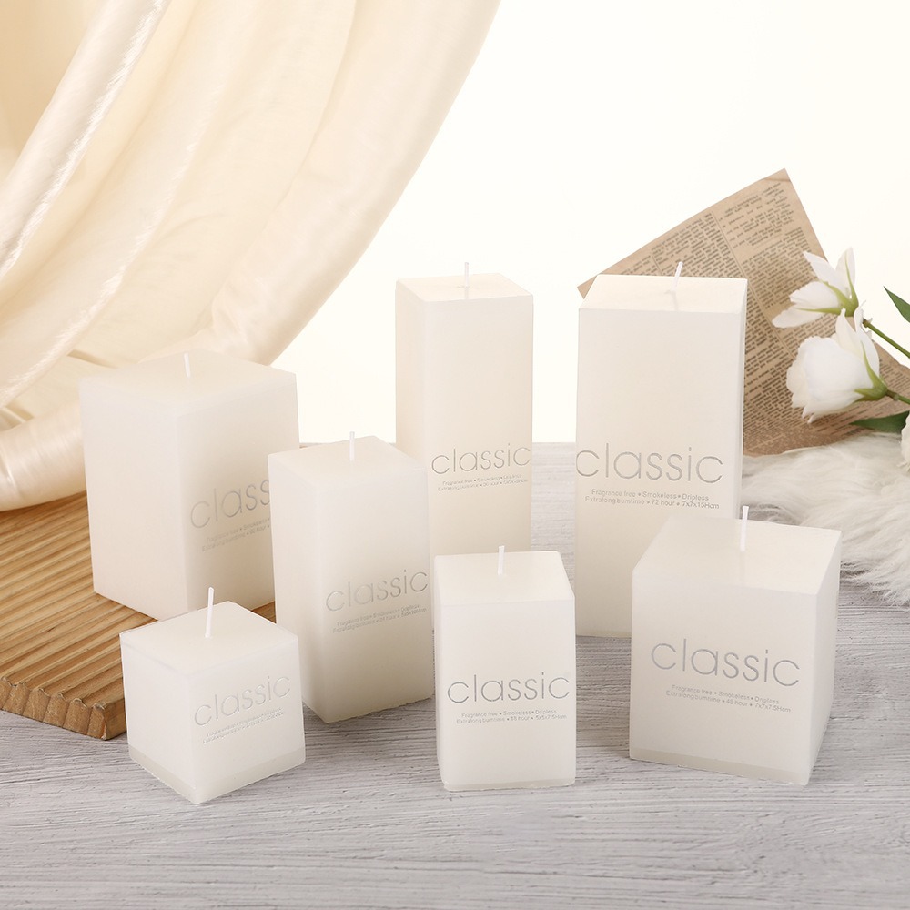 Complete collection of white square candles in seven sizes