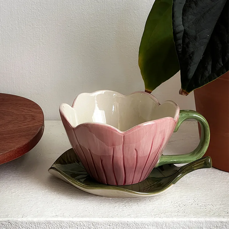 Pink floral ceramic coffee cup and saucer product view