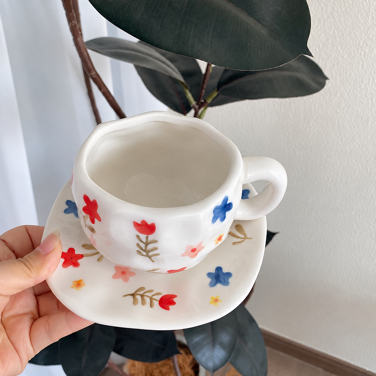 Multicolor floral ceramic cup and saucer set