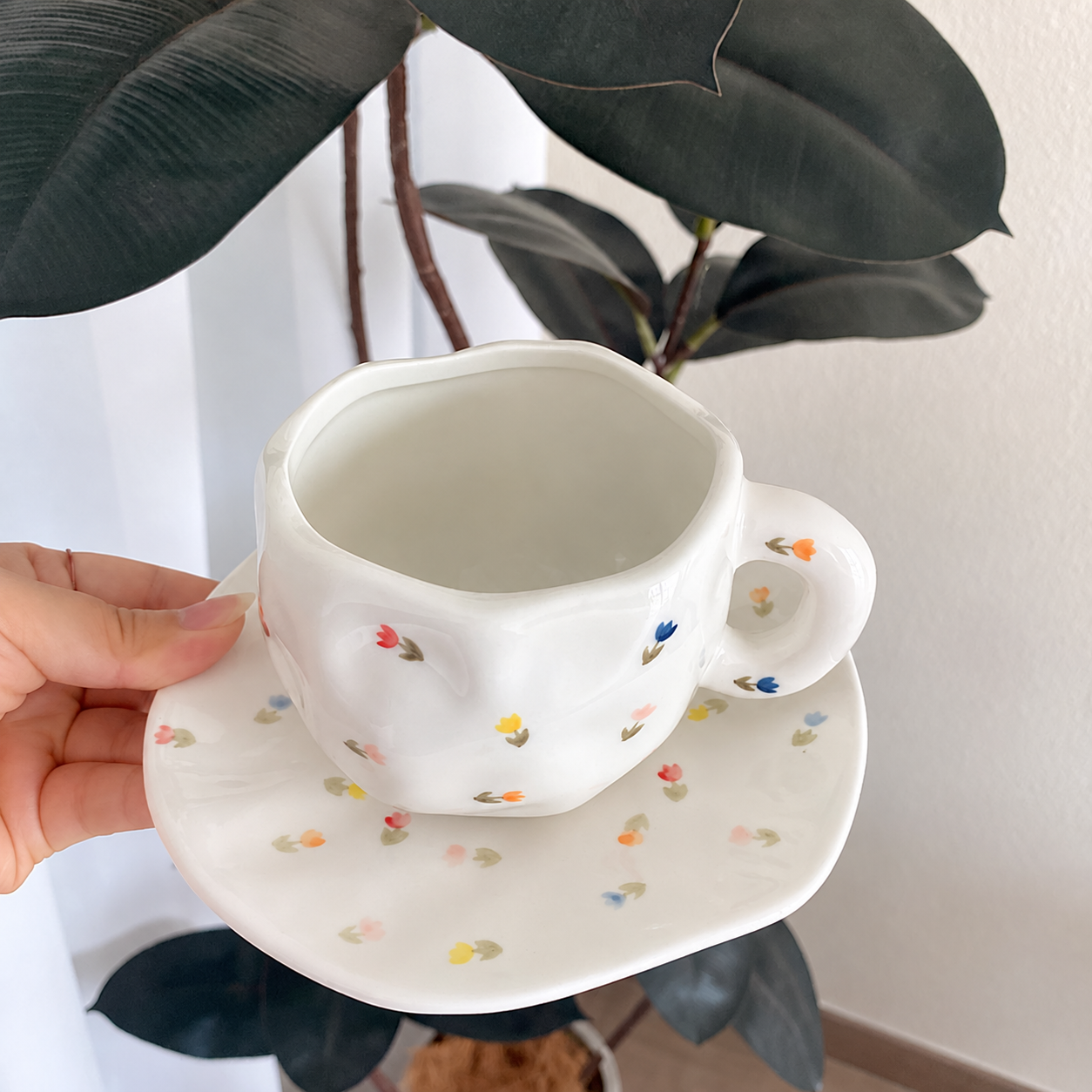 Tiny flower ceramic cup and saucer set