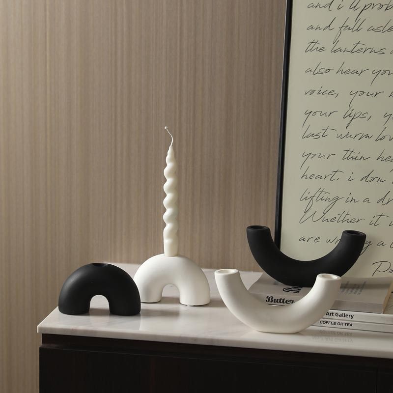 White and black arch and curved porcelain candle holder designs