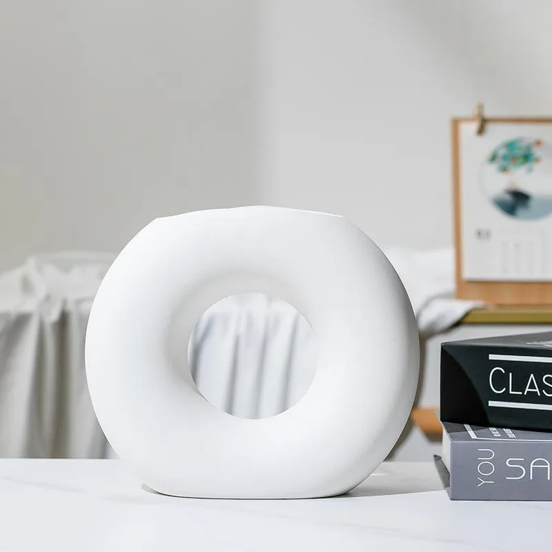 Front view of matte white ring ceramic vase
